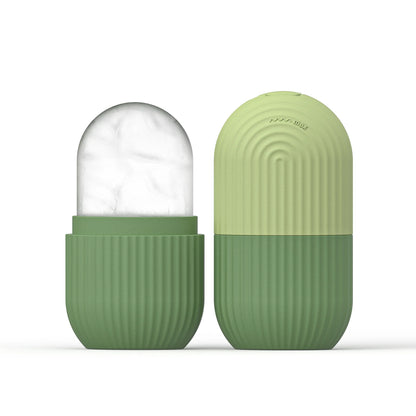 Green Silicone Face Ice Cube Mold & Roller with clear upper section containing ice cubes