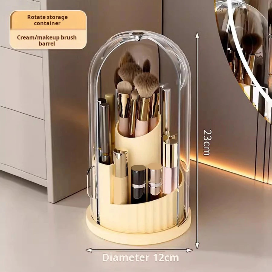 Yellow 180° Rotating Cosmetic Storage Box with clear dome, brushes, and cream products