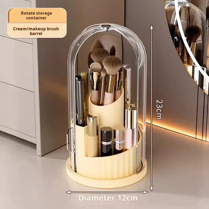 Yellow 180° Rotating Cosmetic Storage Box with clear dome, brushes, and cream products