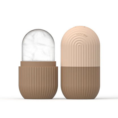 Brown Silicone Face Ice Cube Mold & Roller with clear sections on a white background