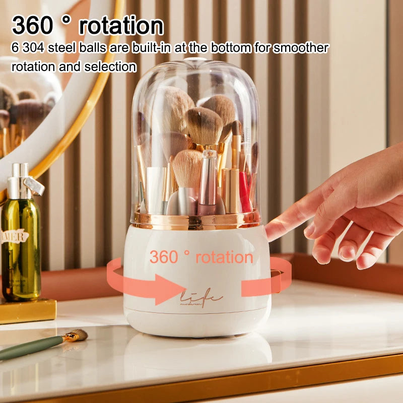 Hand reaching for a white 360° Rotating Makeup Brush Storage Box with rose gold band and life logo