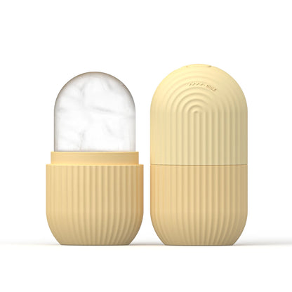 Gold Silicone Face Ice Cube Mold & Roller shown closed and open with marble-patterned ice