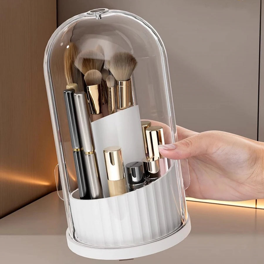White 180° Rotating Cosmetic Storage Box holding gold-handled brushes and cosmetics