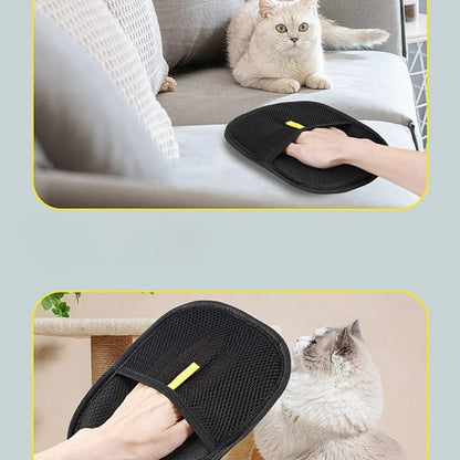 Black oval Pet Grooming Glove with yellow handle removing loose fur from a white cat